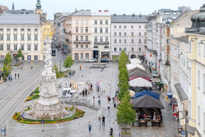 A wide-view of the central square of Linz, with the Radical Times exhibition on display