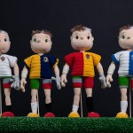 A series of crocheted football players, in various uniforms representing personalized statistics.