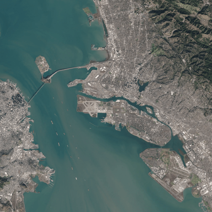 A satellite image of land and water.