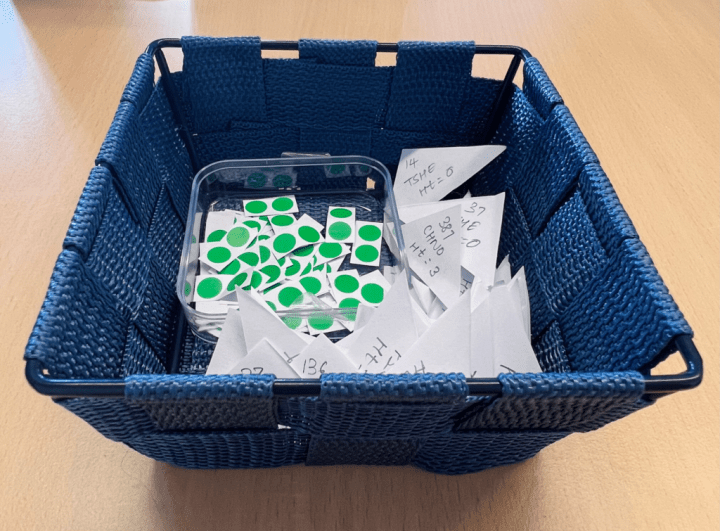 An Image showing a basket with data points for the audience to select and map on the Data & Design poster.
