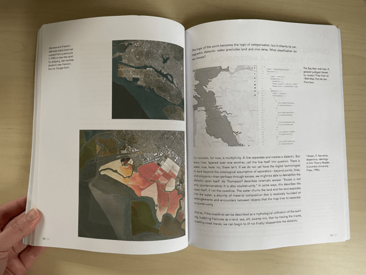 An open book containing satellite images of city maps.