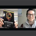 A screenshot of a video meeting between Neil Richards (a man with short dark hair, glasses, and a gray and black beard) and Jenn Schilling (a woman with short brown hair and glasses). Both Neil and Jenn are smiling and holding up their copies of the book Questions in Dataviz.